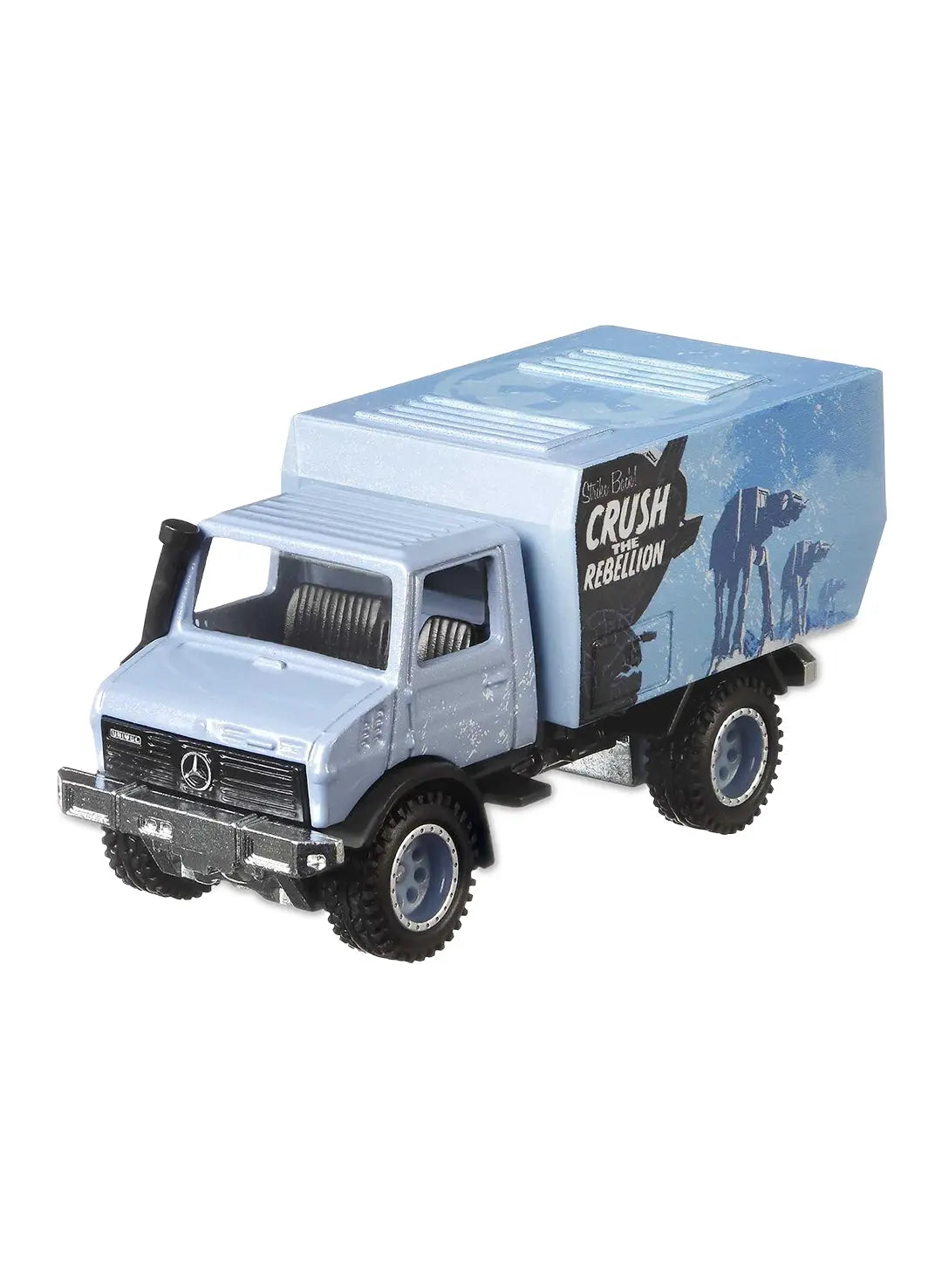 Close-up view of the light blue Hot Wheels AT-AT Mercedes Unimog truck showing Imperial crest door logos and rugged off-road wheels.