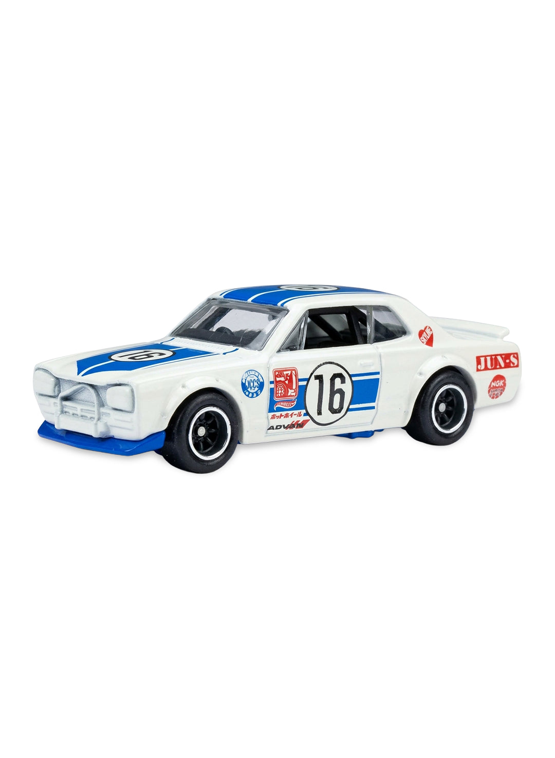 Close-up view of the pearl white Hot Wheels Hakosuka Nissan Skyline HT 2000GT-X showing side racing decals and dark grey wheels.