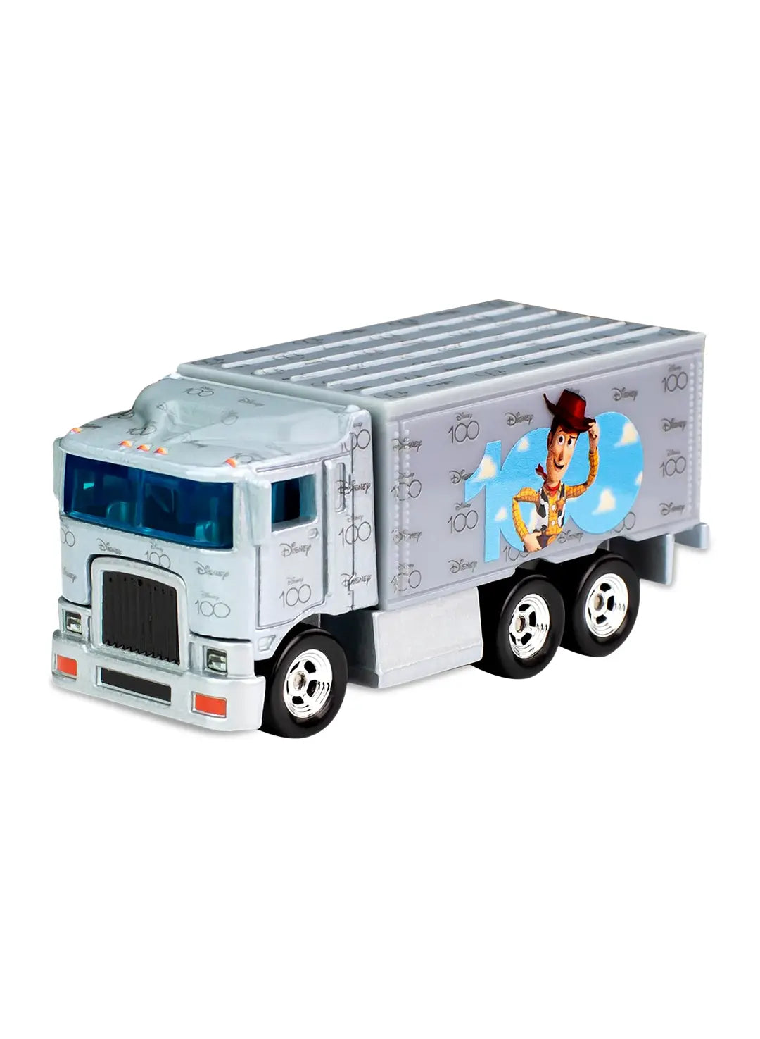 Close-up view of the pearlescent white Hot Wheels Woody Hiway Hauler truck showing blue side graphics and multi-spoke chrome wheels.