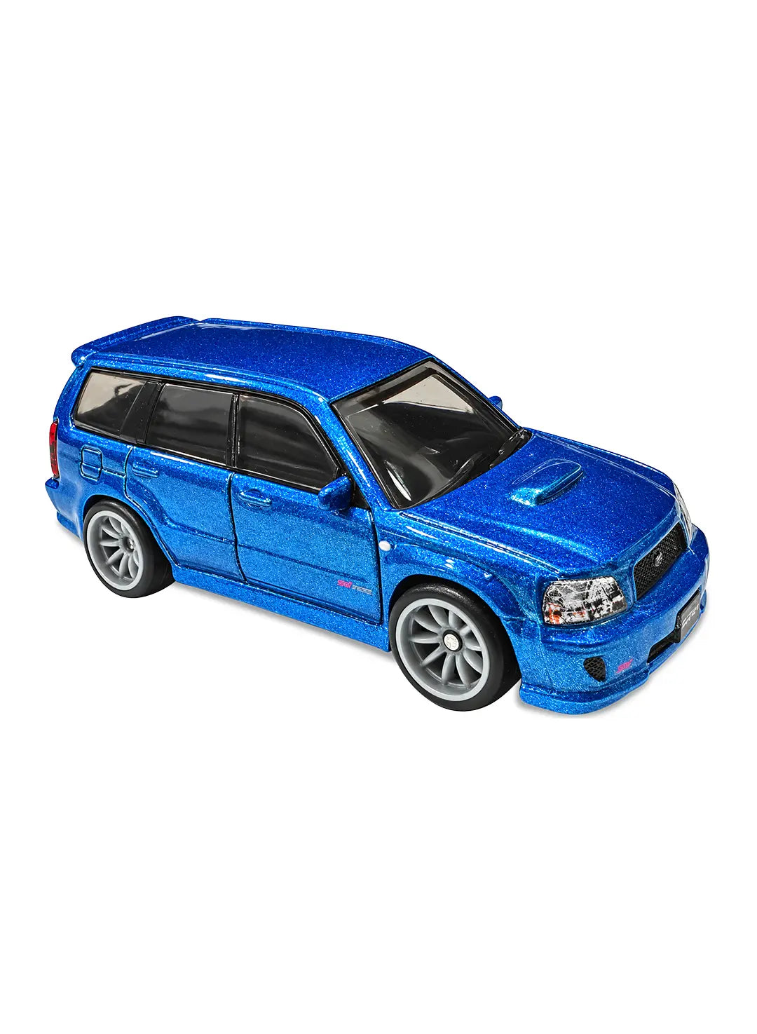 Close-up view of the premium world rally blue Hot Wheels Subaru Forester STi displaying its lowered performance wagon body kit layouts, signature pink STi badging accents, and multi-spoke gold RR8SP Real Riders wheels.