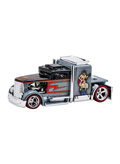 Close-up view of the metalflake gray and black Hot Wheels 2013 AC/DC Convoy Custom truck showing side band member graphics and redline Real Riders wheels.