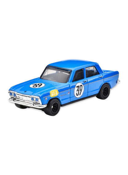 Close-up view of the racing blue Hot Wheels '64 Prince Skyline GT showing side racing number 39 livery and detailed silver 8-spoke Real Riders wheels.