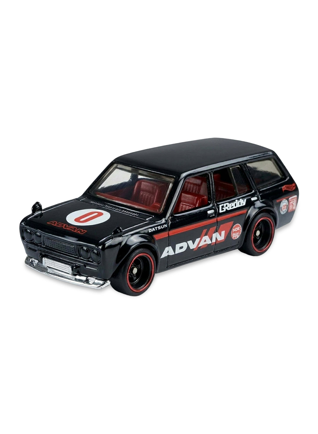 Close-up view of the charcoal black Hot Wheels Japan Historics '71 Datsun 510 Wagon showing Advan racing graphics and redline wheels.