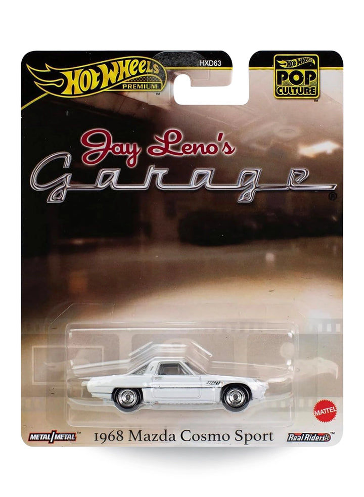 Hot Wheels Premium Pop Culture Jay Leno's Garage 1968 Mazda Cosmo Sport 1:64 scale premium diecast car mint on its original garage-themed celebrity branding blister card.