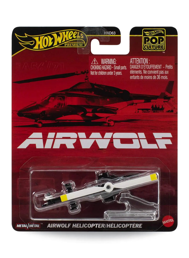 Hot Wheels Premium Pop Culture Airwolf Helicopter premium diecast vehicle mint on its original retro action television show themed red card displaying a silhouette photo of the high-tech chopper.