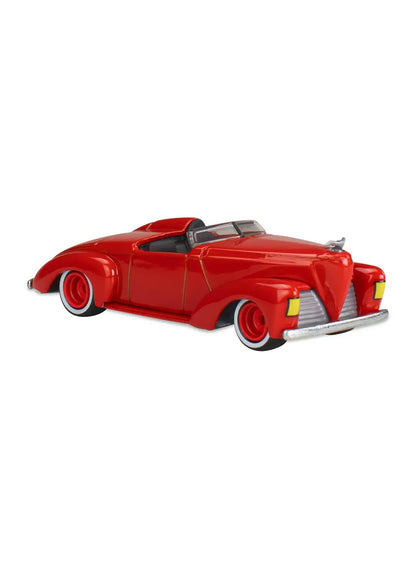 Close-up view of the deep red Hot Wheels First Batmobile vintage coupe showing a curved aerodynamic fin and silver-trimmed redline Real Riders wheels.