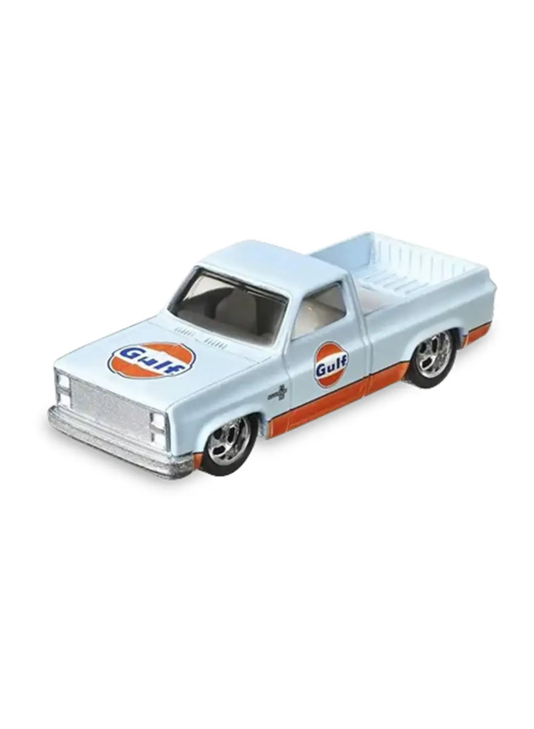 Close-up view of the light blue Hot Wheels Gulf '83 Chevy Silverado truck showing orange lower panels and chrome Real Riders wheels.