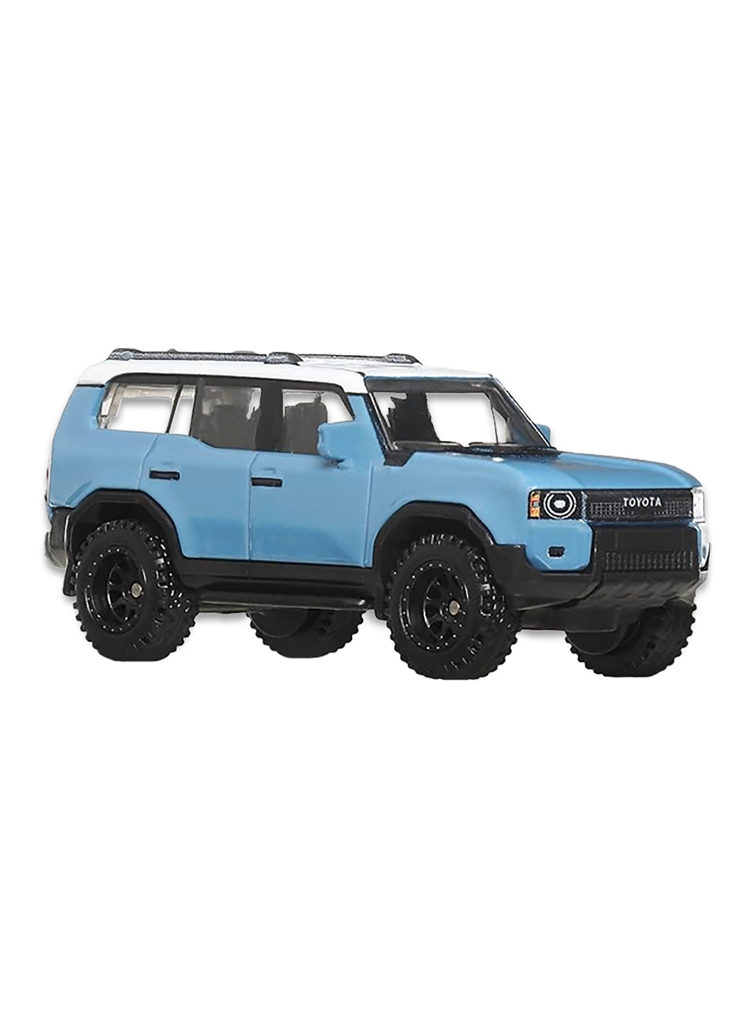 Close-up view of the Heritage Blue Hot Wheels Forza Horizon 6 '24 Toyota Land Cruiser showing a white contrast roof, detailed front grilles, black fender flares, and rugged black multi-spoke Real Riders wheels.