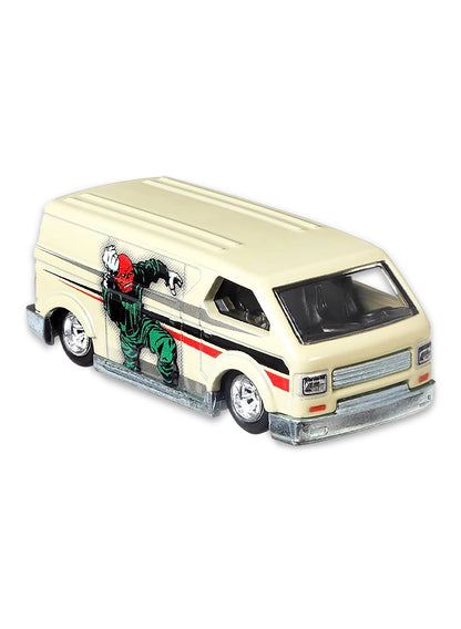 Close-up view of the beige Hot Wheels Red Skull MBK Van showing black and red side racing stripes and chrome wheels.