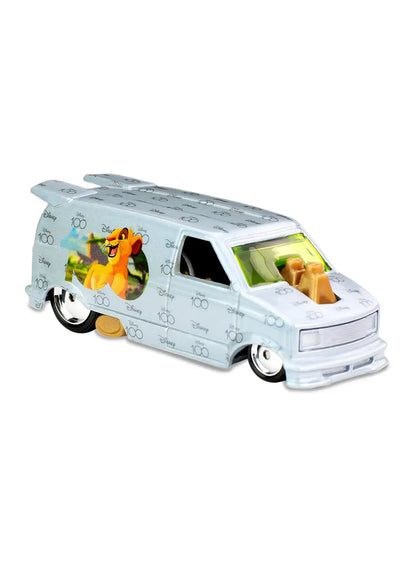 Close-up view of the metalflake powder blue Hot Wheels Simba 1985 Chevy Astro Van showing side cartoon graphics and chrome wheels.
