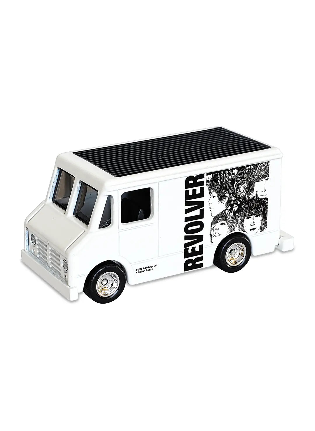 Close-up view of the flat white Hot Wheels The Beatles Revolver Combat Medic van showing side line-art graphics and chrome wheels.