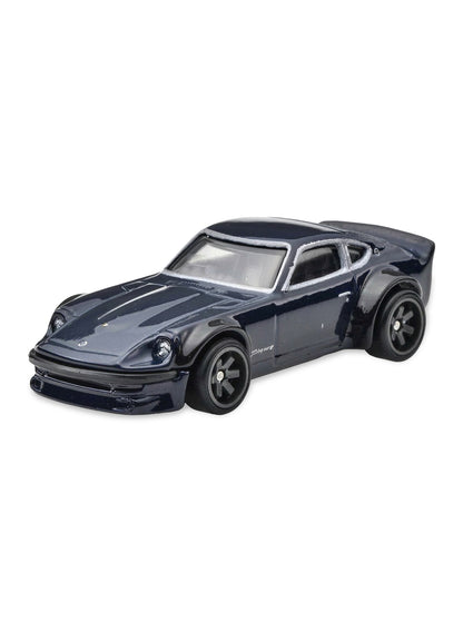 Close-up view of the midnight blue Hot Wheels Nissan Fairlady Z sports car showing sleek tuner body lines and dark grey 6-spoke Real Riders wheels.