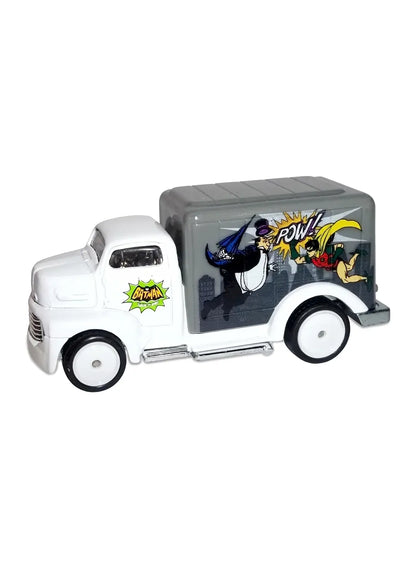 Close-up view of the white Hot Wheels The Penguin '49 Ford COE cargo truck showing side graphics and white disk Real Riders wheels.