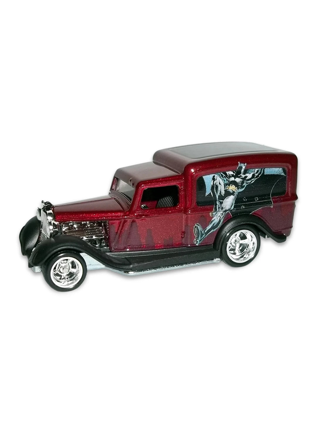 Close-up view of the candy red Hot Wheels Batman '34 Dodge Delivery Bus showing side action graphics and deep-dish chrome Real Riders wheels.
