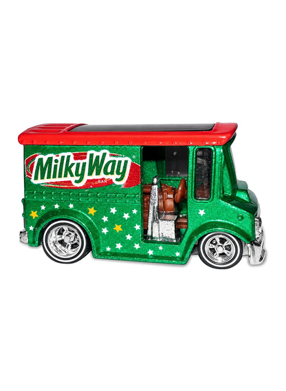 Close-up view of the metalflake green and brown Hot Wheels 2013 Milky Way Bread Box truck showing side graphics and chrome Real Riders wheels.
