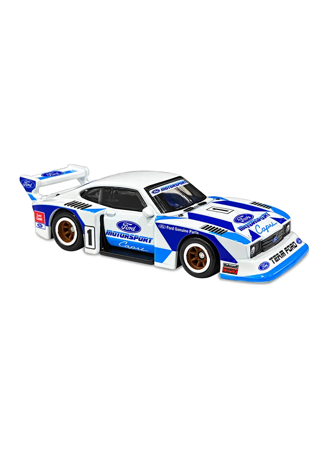 Close-up view of the premium white Hot Wheels Ford Capri Gr.5 New Casting showing detailed blue and black custom race stripes, aggressive widebody aero box design, and white-rimmed Real Riders RR8SP performance wheels.