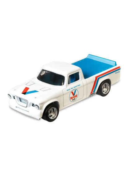 Close-up view of the white Hot Wheels Valvoline '63 Studebaker Champ truck showing blue and red side racing stripes and chrome wheels.