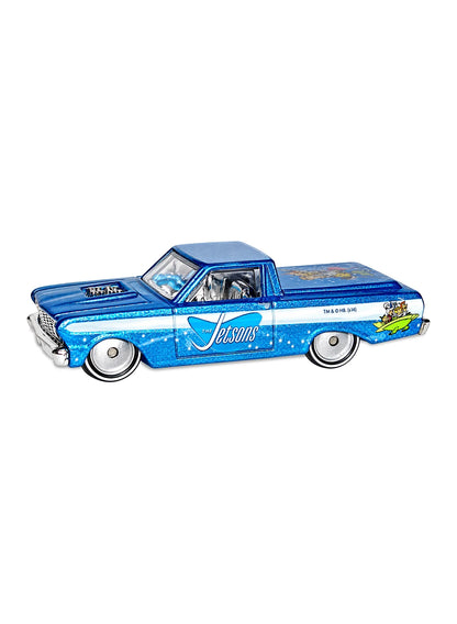 Close-up view of the metallic light blue Hot Wheels The Jetsons '65 Ford Ranchero showing side graphics and solid dish Real Riders wheels.