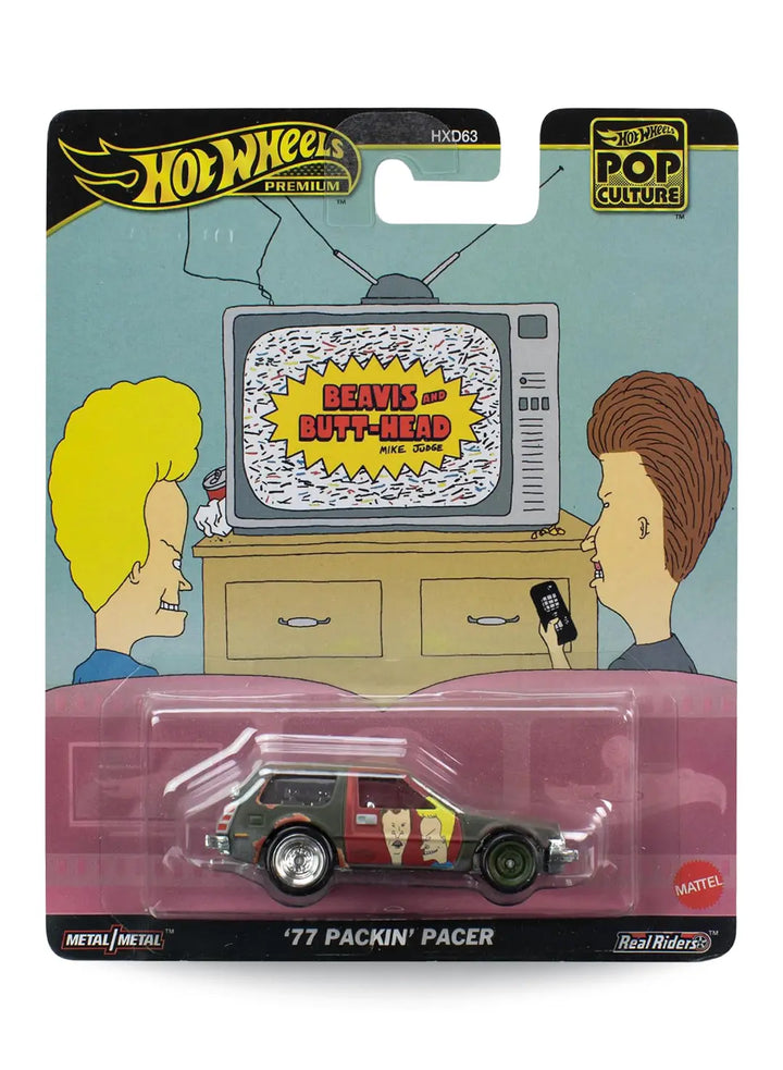 Hot Wheels Premium Pop Culture Beavis and Butt-Head '77 Packin' Pacer 1:64 scale premium diecast car mint on its original cartoon animation themed blister card.