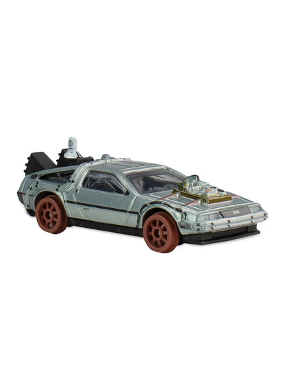 Close-up view of the brushed silver Hot Wheels Back to the Future Time Machine 50's Version showing a hood-mounted circuit board tube detail and classic brown moon disc wheels.