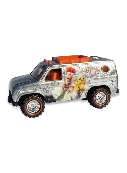 Close-up view of the metalflake silver Hot Wheels Beaker and Bunsen Baja Breaker van showing side laboratory graphics and redline Real Riders wheels.