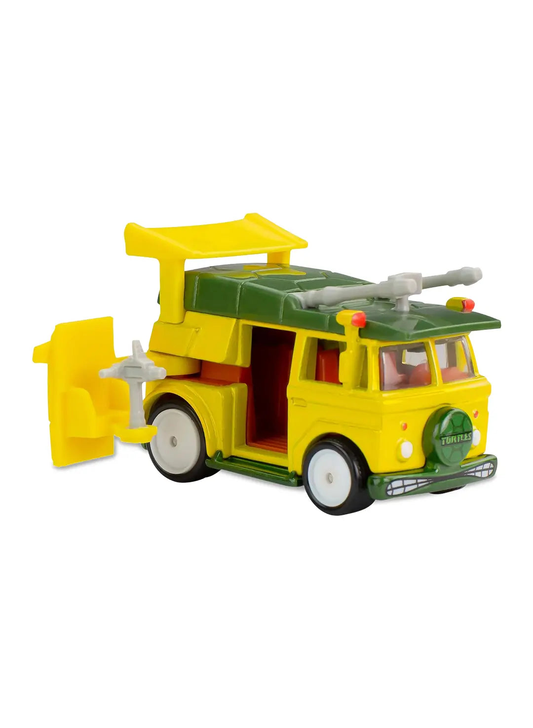 Close-up view of the yellow and green Hot Wheels Teenage Mutant Ninja Turtles Party Wagon showing a high-roof spoiler, side door graphics, molded roof weapons, and white-rimmed Real Riders wheels.