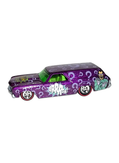Close-up view of the metallic purple Hot Wheels The Riddler '70 Chevelle Delivery wagon showing question mark graphics and redline Real Riders wheels.