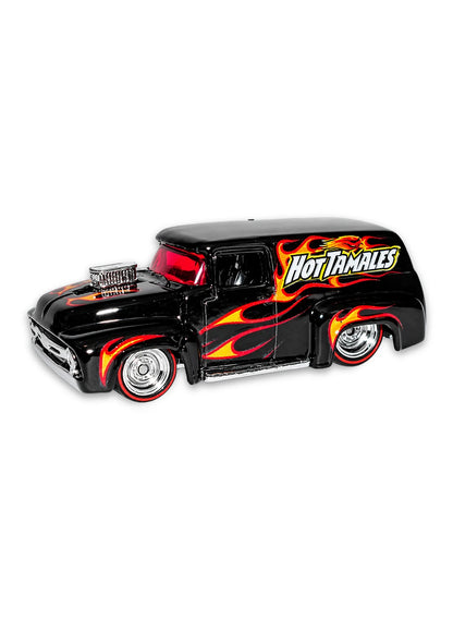 Close-up view of the black Hot Wheels Hot Tamales '56 Ford F-100 Panel truck showing side flame graphics and chrome Real Riders wheels.