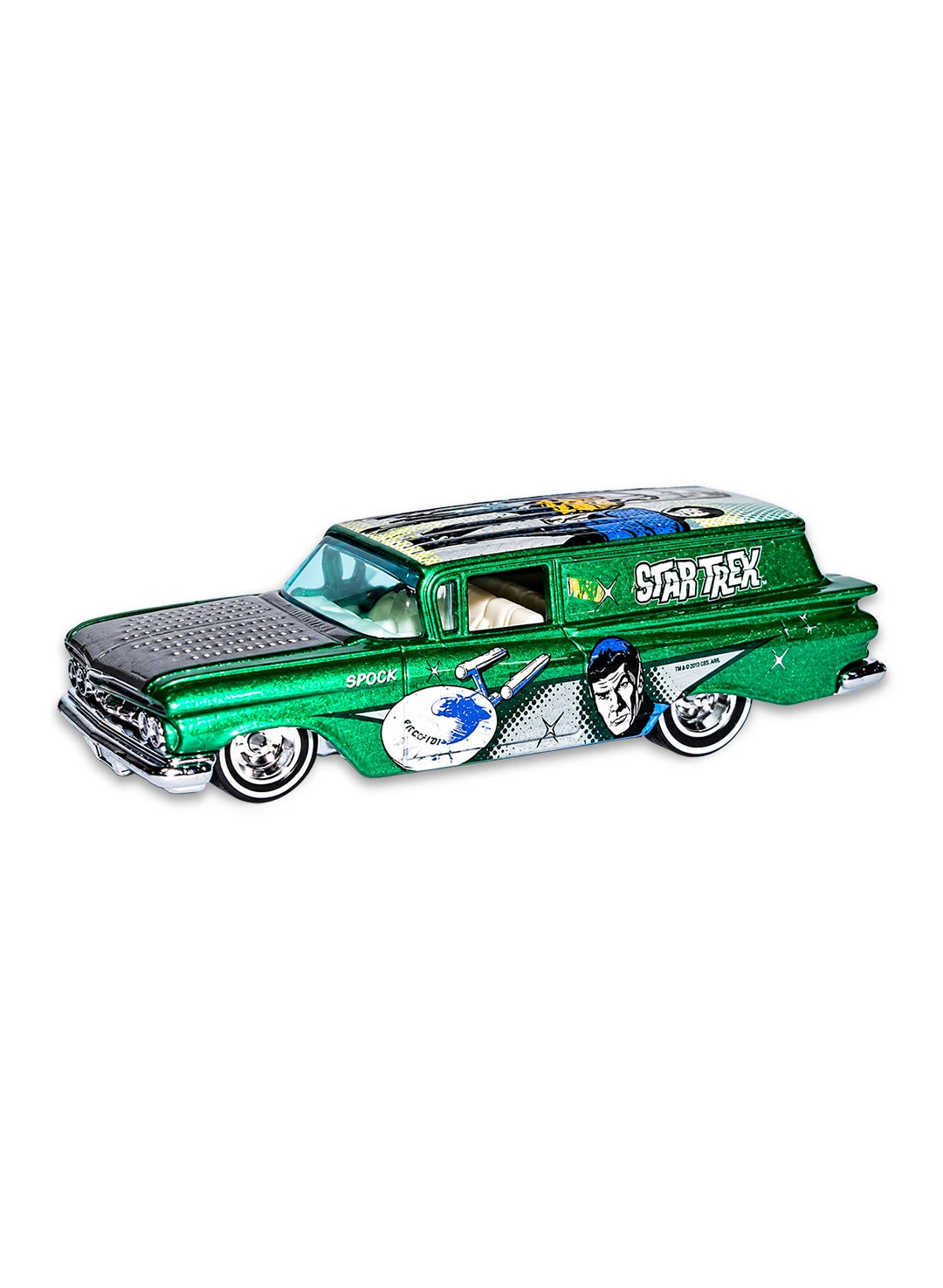Close-up view of the metalflake green Hot Wheels Star Trek '56 Chevy Nomad Delivery showing side Spock graphics and white roof.