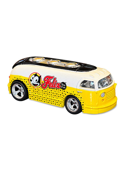 Close-up view of the white and yellow Hot Wheels 2013 Felix the Cat Haulin' Gas truck showing side comic graphics and chrome Real Riders wheels.
