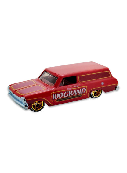 Close-up view of the red Hot Wheels 100 Grand '64 Chevy Nova Delivery wagon showing side panel graphics and gold Real Riders wheels.