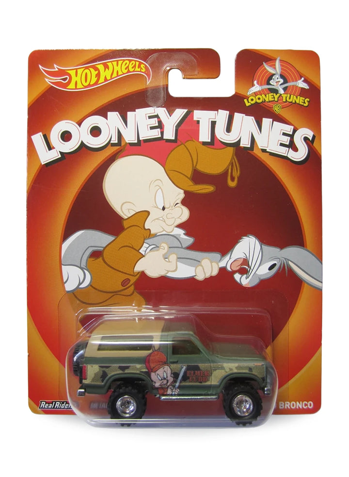 Hot Wheels Pop Culture 2013 Looney Tunes '85 Ford Bronco 1:64 scale diecast truck mint on its original Elmer Fudd and Bugs Bunny blister card.