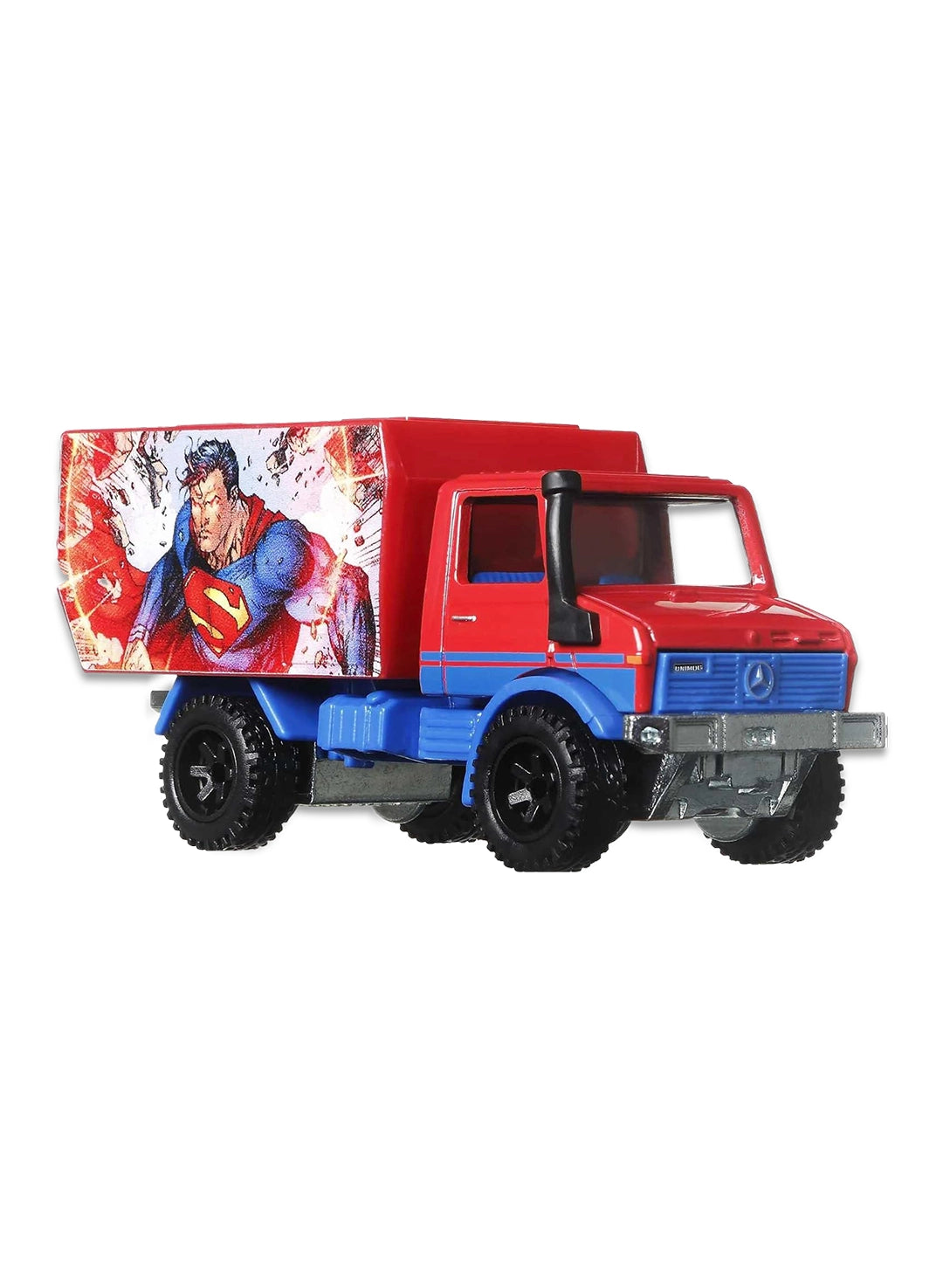 Close-up view of the two-tone red and blue Hot Wheels Superman Mercedes Unimog truck showing bedside graphics and off-road wheels.
