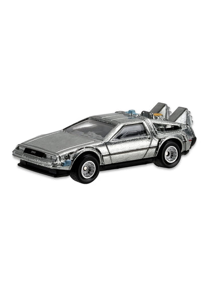 Close-up view of the brushed silver Hot Wheels Back to the Future Time Machine DeLorean showing rear nuclear reactor detailing, external cables, and silver mesh Real Riders wheels.