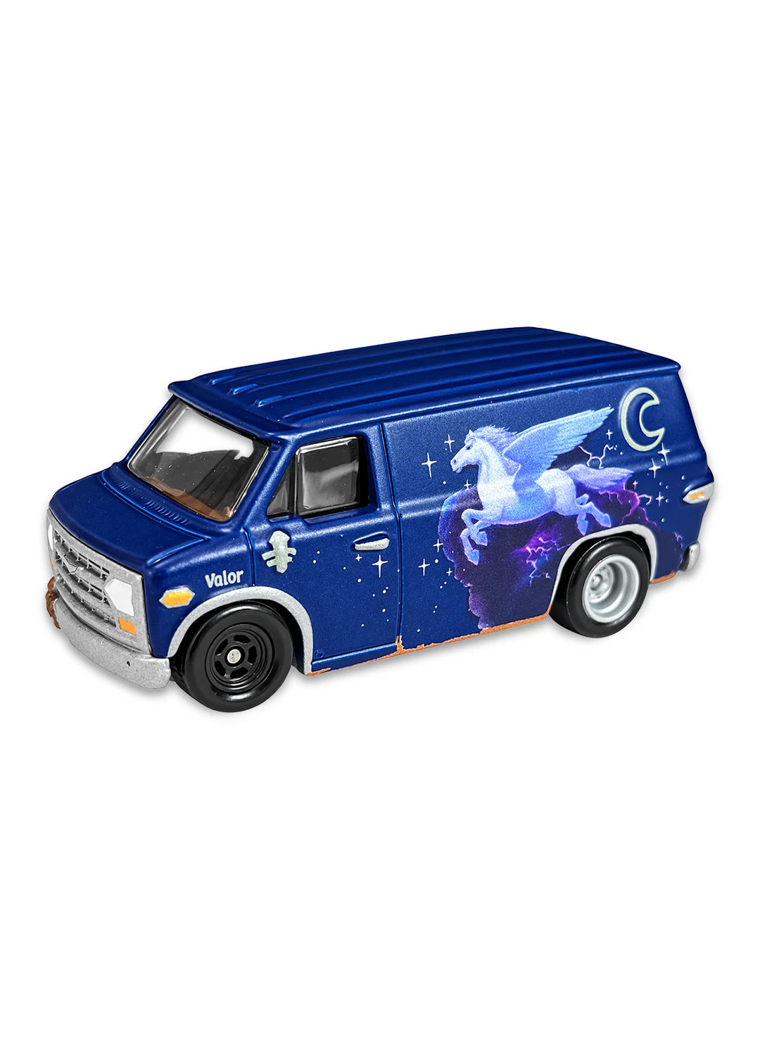 Close-up view of the dark metallic blue Hot Wheels Onward Guinevere Van showing a detailed side wrap graphic with a white pegasus illustration, crescent moon windows, and mismatched front and rear chrome/black Real Riders wheels.
