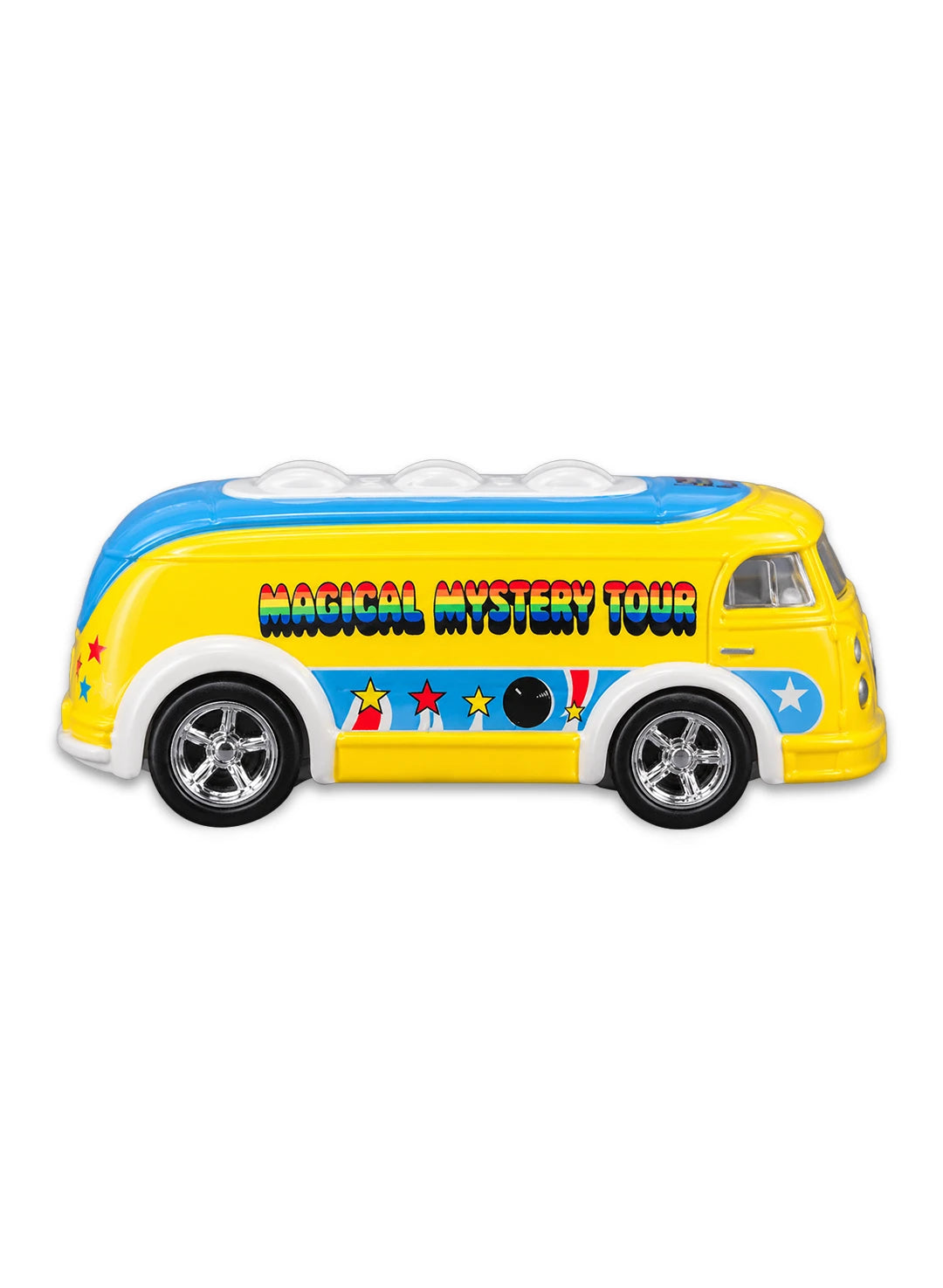 Close-up view of the yellow Hot Wheels The Beatles Haulin' Gas truck showing its blue roof, side rainbow graphics, and chrome Real Riders wheels.