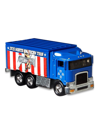 Close-up view of the blue Hot Wheels Led Zeppelin Hiway Hauler tour truck showing red and white striped cargo box panels.