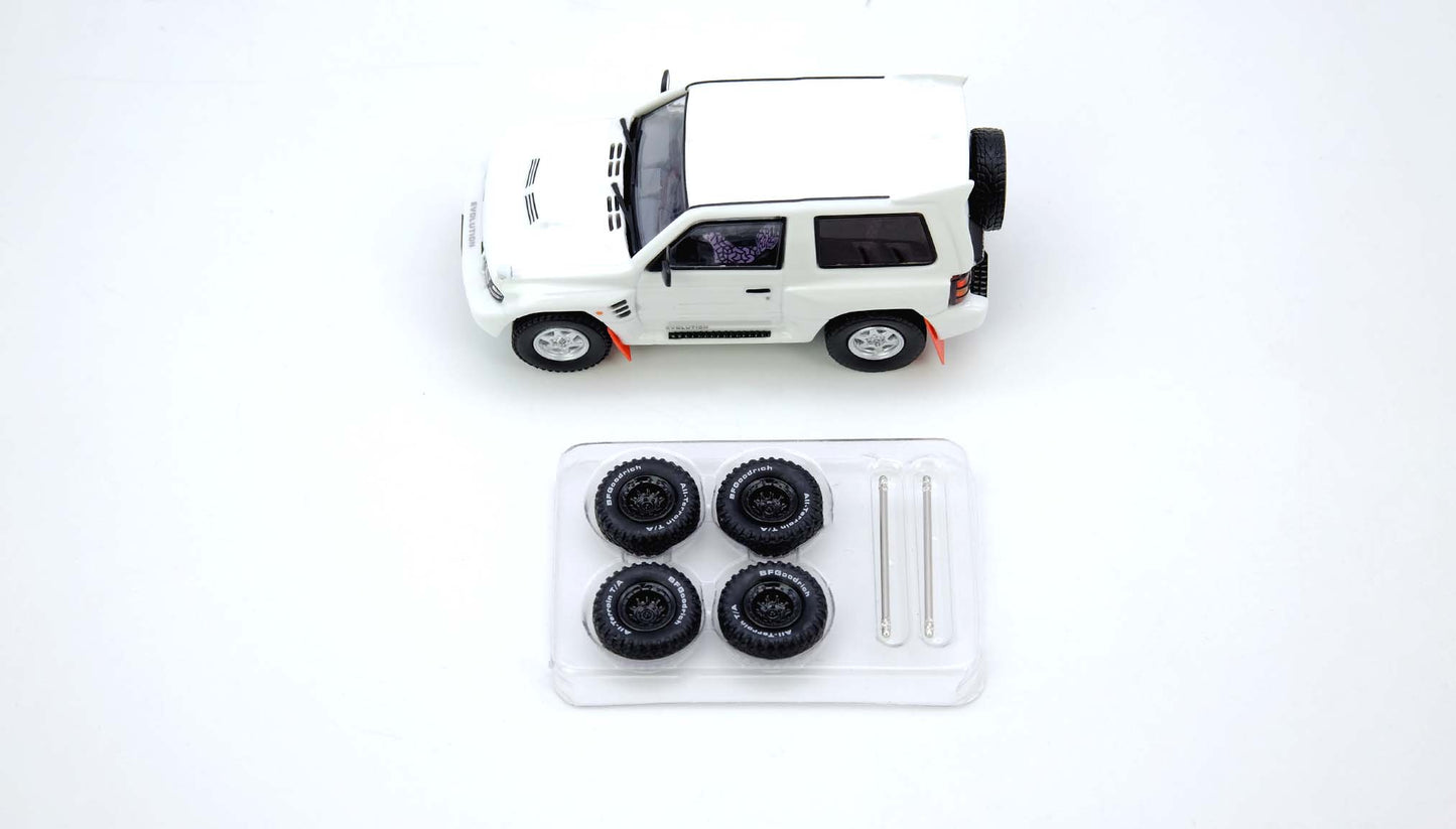 Mitsubishi Pajero Evolution White With Extra Wheels