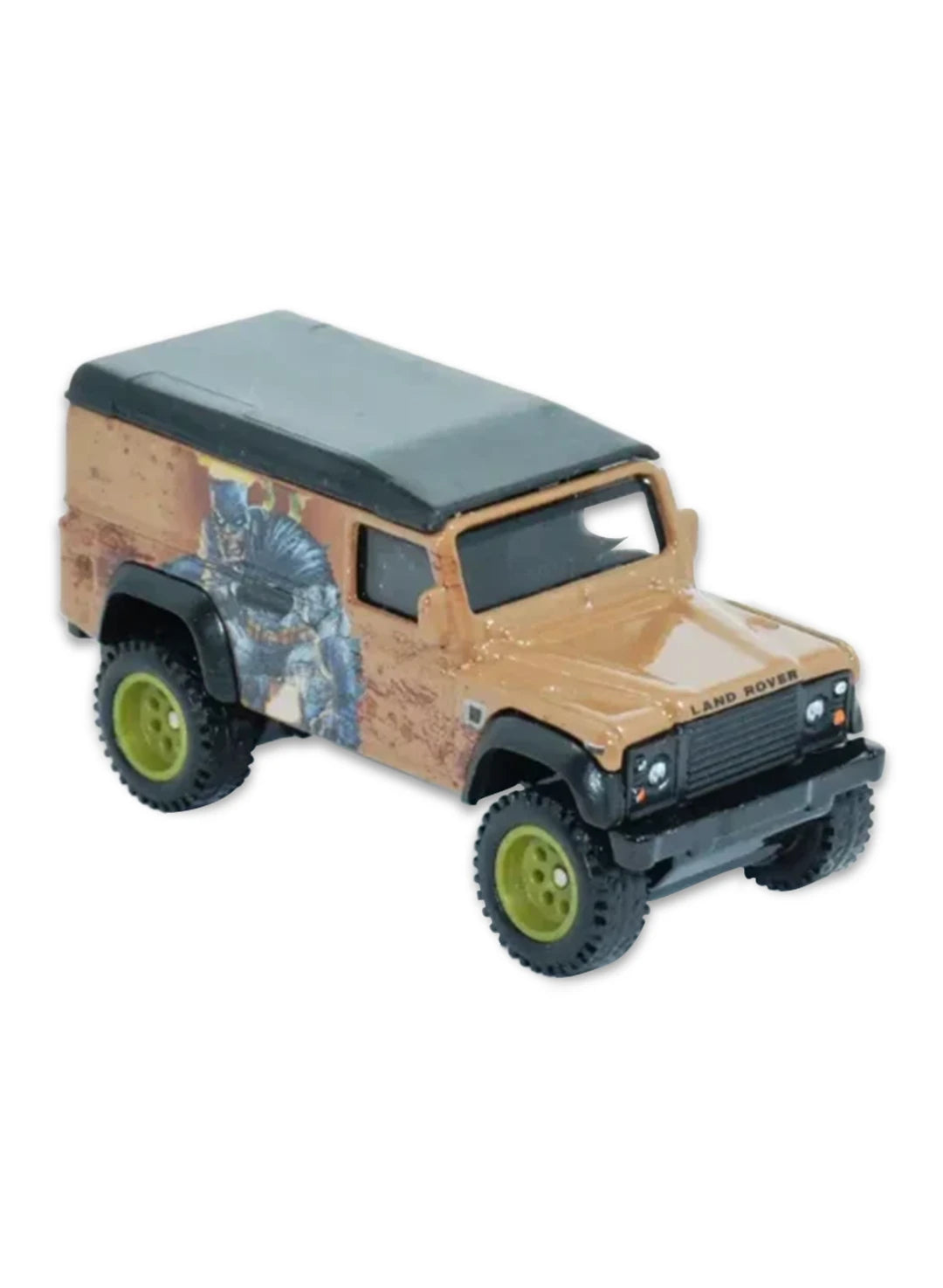 Close-up view of the mud-splattered tan Hot Wheels Batman Land Rover Defender 110 showing off-road olive green wheels.