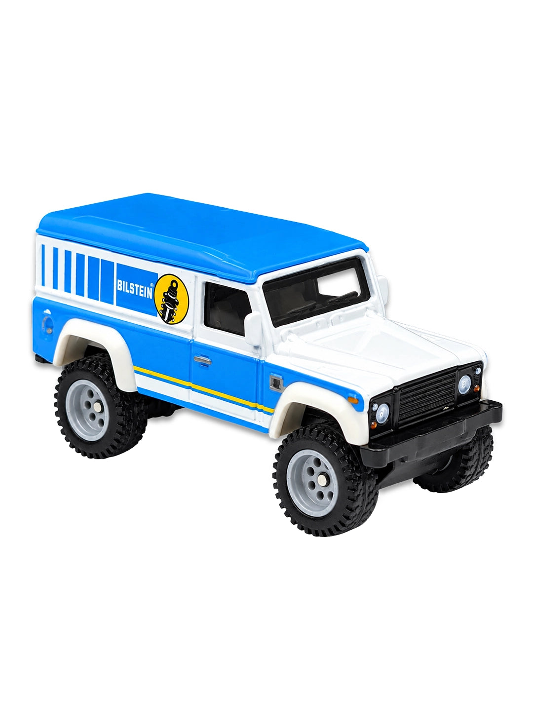 Close-up view of the two-tone white and blue Hot Wheels Bilstein Land Rover Defender 110 showing off-road Real Riders wheels.