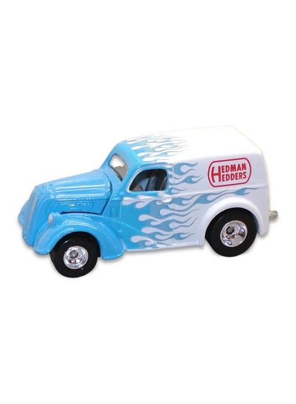 Hot Wheels Delivery Slick Rides 2010 Ford Anglia Panel 1:64 – Light Blue & Pearl White