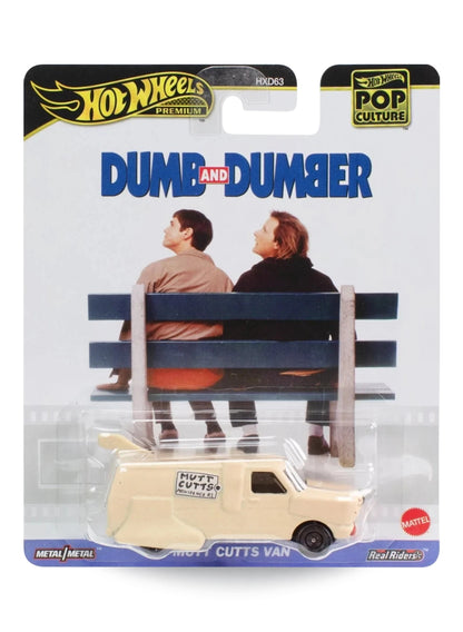 Hot Wheels Premium Pop Culture Dumb and Dumber Mutt Cutts Van 1:64 scale premium diecast novelty vehicle mint on its original comedy movie themed blister card.
