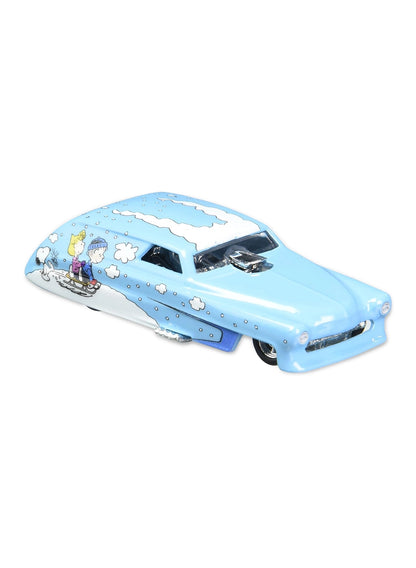 Close-up view of the light blue Hot Wheels Peanuts Rolling Thunder streamliner showing side sledding graphics and chrome Real Riders wheels.