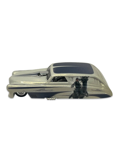 Close-up view of the frost white Hot Wheels Star Wars Rolling Thunder car showing side Hoth tauntaun graphics and chrome Real Riders wheels.