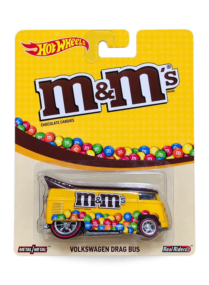 Hot Wheels Premium Pop Culture Mars Candy M&M's Volkswagen Drag Bus 1:64 scale diecast van mint on its original yellow quilted blister card.